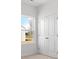 Bright bedroom featuring double door closet and natural light from the window at 1071 Bull Dog Ln, Wingate, NC 28174