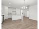 Open concept kitchen and living area featuring hardwood floors and recessed lighting at 1071 Bull Dog Ln, Wingate, NC 28174