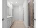 Bright bathroom featuring a double sink vanity and a glass shower at 1074 Bull Dog Ln, Wingate, NC 28174