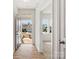 Inviting entryway with wood flooring, white walls, and a glimpse into the living room at 1074 Bull Dog Ln, Wingate, NC 28174