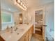 Bright bathroom features double sinks, tile floor, a large mirror, and a separate shower and tub at 1209 Pressley Downs Se Dr, Concord, NC 28025