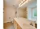 Bright bathroom features double sinks, tile floor, a large mirror, and a separate shower and tub at 1209 Pressley Downs Se Dr, Concord, NC 28025