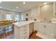 The kitchen offers a stainless steel dishwasher and a breakfast bar perfect for meal prep at 1209 Pressley Downs Se Dr, Concord, NC 28025