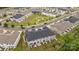 Community aerial view showcasing townhome layout and greenspace at 12205 Gambrell Dr, Charlotte, NC 28278