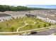 Community aerial view showcasing common greenspace with picnic areas and walking paths at 12205 Gambrell Dr, Charlotte, NC 28278