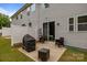 Private backyard with a patio area, perfect for grilling and outdoor entertaining at 12205 Gambrell Dr, Charlotte, NC 28278