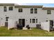 Private backyard with a patio area, perfect for grilling and outdoor entertaining at 12205 Gambrell Dr, Charlotte, NC 28278