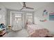 Charming ' bedroom with a cozy bed, playful decor, and lots of natural light at 12205 Gambrell Dr, Charlotte, NC 28278