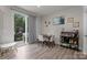Bright dining area with access to backyard, view of the deck and patio, and a coffee bar area at 12205 Gambrell Dr, Charlotte, NC 28278
