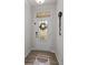 Bright entryway featuring a decorative glass door, coat hooks, and wood-look flooring at 12205 Gambrell Dr, Charlotte, NC 28278