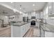 Spacious kitchen with a large island, granite countertops, stainless steel appliances, and an open floorplan at 12205 Gambrell Dr, Charlotte, NC 28278