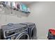 Convenient laundry room featuring modern washer and dryer, with plenty of storage space at 12205 Gambrell Dr, Charlotte, NC 28278