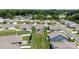 Aerial view of a home surrounded by a well manicured lawn in a residential neighborhood at 128 Asher Ln, Mooresville, NC 28115