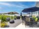Spacious outdoor deck with seating area, dining table, and grill, perfect for summer gatherings at 128 Asher Ln, Mooresville, NC 28115