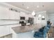Modern kitchen with granite countertops, stainless steel appliances, and ample cabinet space at 128 Asher Ln, Mooresville, NC 28115