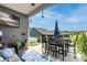 Covered patio with a seating area and dining table, ideal for relaxing or entertaining outdoors at 128 Asher Ln, Mooresville, NC 28115
