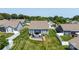 An aerial view showcases the landscaped backyard, including the stone surround patio at 128 Asher Ln, Mooresville, NC 28115