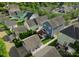 Aerial view of the home, highlighting the backyard patio and surrounding neighborhood at 14034 Holly Springs Dr, Huntersville, NC 28078