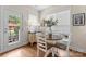 Cozy dining area with natural light and access to outdoor patio at 14034 Holly Springs Dr, Huntersville, NC 28078