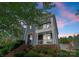 Inviting two-story home with double porches, perfect for enjoying the outdoors at 14034 Holly Springs Dr, Huntersville, NC 28078