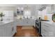 Well-appointed kitchen featuring white cabinetry, subway tile backsplash, and stainless steel appliances at 14034 Holly Springs Dr, Huntersville, NC 28078