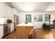 Modern kitchen with stainless steel appliances, white cabinetry, and a center island at 1408 Rinehart Ct, Charlotte, NC 28270