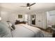 Spacious main bedroom has hardwood floors, ceiling fan, ensuite bathroom and walk-in closet at 1408 Rinehart Ct, Charlotte, NC 28270