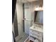 Modern bathroom with stylish marble tile shower, sleek fixtures, and vanity with marble countertop at 1427 Kinks Ln # 47, Maiden, NC 28650