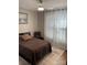 Cozy bedroom with a ceiling fan and bright windows, perfect for relaxing and unwinding at 1427 Kinks Ln # 47, Maiden, NC 28650