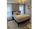 Bedroom with windows, neutral decor, and a plush rug, creating a comfortable and inviting space at 1427 Kinks Ln # 47, Maiden, NC 28650