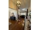 Welcoming entryway with hardwood floors, staircase, and a view into the living room at 1427 Kinks Ln # 47, Maiden, NC 28650