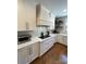 Bright kitchen with white cabinetry, quartz countertops, subway tile backsplash, and modern appliances at 1427 Kinks Ln # 47, Maiden, NC 28650
