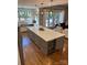Modern eat-in kitchen featuring a large island with seating, pendant lighting and modern appliances at 1427 Kinks Ln # 47, Maiden, NC 28650