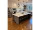 Eat-in kitchen featuring a large island with seating, pendant lighting and modern appliances at 1427 Kinks Ln # 47, Maiden, NC 28650