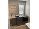 Well-equipped laundry room with modern washer and dryer, sink, and ample counter space at 1427 Kinks Ln # 47, Maiden, NC 28650