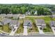Aerial view of homes on wooded lots backing to a lake at 14407 Cardwell Hill Ln, Charlotte, NC 28278
