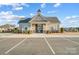 Charming community clubhouse with well-manicured landscaping, providing a welcoming amenity for residents at 1441 Mccollum St, Monroe, NC 28112