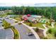 Aerial view of community clubhouse, pool, tennis courts, bocce ball courts and parking at 1467 Tranquility Blvd, Lancaster, SC 29720