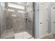 Walk-in shower with beautiful grey tiling and glass doors at 1467 Tranquility Blvd, Lancaster, SC 29720