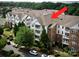 Well maintained condominium complex with mature landscaping, and ample parking at 14979 Santa Lucia Dr # 2408, Charlotte, NC 28277