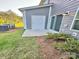 An inviting backyard area with lush greenery and exterior home details at 1510 Old Rivers Rd # 171, Concord, NC 28027