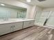 Bathroom featuring a double vanity, large mirror and walk-in shower at 1510 Old Rivers Rd # 171, Concord, NC 28027