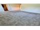 This bedroom features neutral walls and grey carpet at 1510 Old Rivers Rd # 171, Concord, NC 28027