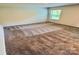 Bedroom featuring a window and neutral carpet at 1510 Old Rivers Rd # 171, Concord, NC 28027