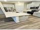 Bright kitchen with stainless steel appliances, quartz countertops, and ample cabinet space at 1510 Old Rivers Rd # 171, Concord, NC 28027