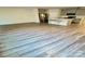 Open floor plan connecting living area to modern kitchen with stainless appliances and island at 1510 Old Rivers Rd # 171, Concord, NC 28027