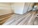 Bright living area featuring wood-look floors, neutral walls and a modern aesthetic at 1510 Old Rivers Rd # 171, Concord, NC 28027