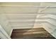 Spacious walk-in pantry features white wire shelving to maximize storage space at 1510 Old Rivers Rd # 171, Concord, NC 28027