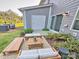 A charming patio space with comfortable seating and manicured landscaping at 1510 Old Rivers Rd # 171, Concord, NC 28027