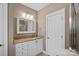 Neutral-toned bathroom featuring granite vanity, and a shower behind a glass door at 15830 Waterfront Dr, Huntersville, NC 28078
